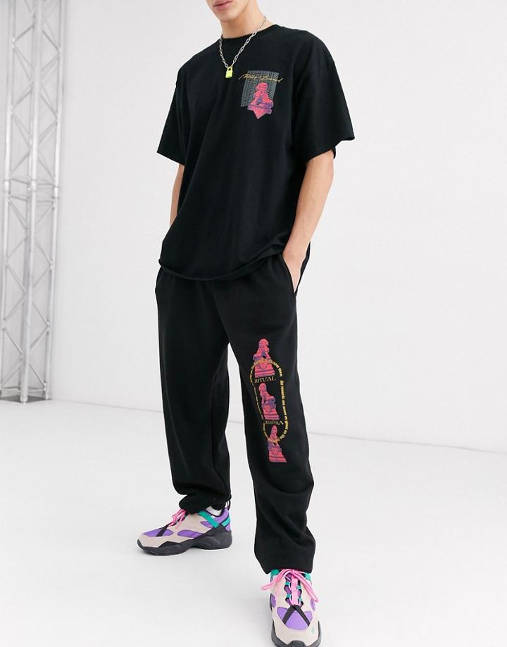 Nothing Is Sacred Pink Print Jogger In Black
