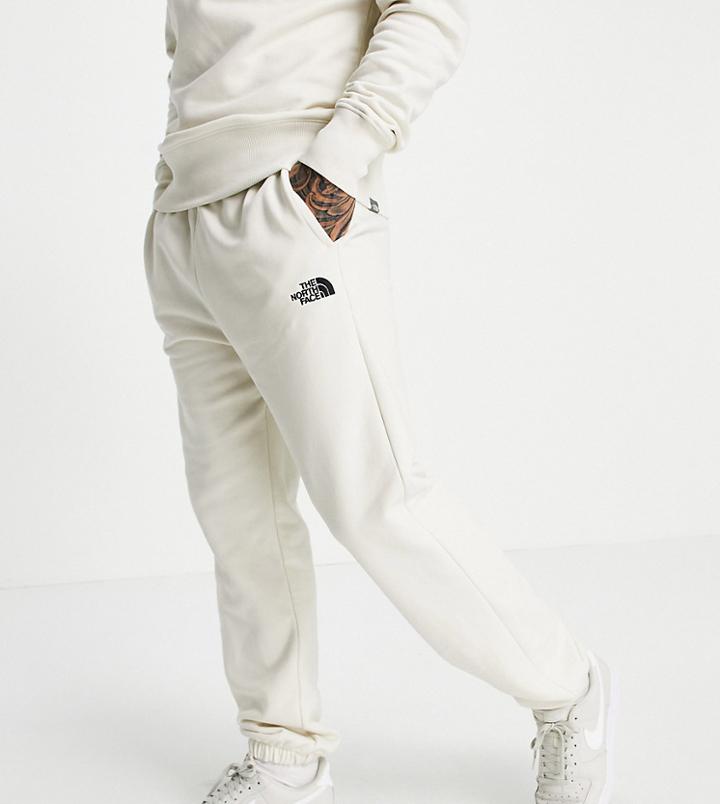 The North Face Oversized Essential Sweatpants In Cream Exclusive At Asos-white