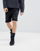 Asos Design Drop Crotch Denim Shorts With Extreme Rips In Washed Black - Black