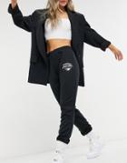 Asos Design Low Rise Sweatpants With Logo In Black