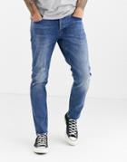Asos Design Cone Mill Denim Slim 'american Classic' Jeans In Mid Wash Blue With Abrasions And Raw Hem