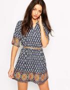 Yumi Belted Dress In Border Tile Print - Navy