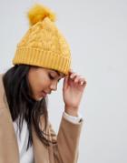 Oasis Cable Knit Beanie With Fur Pom Pom In Yellow - Yellow