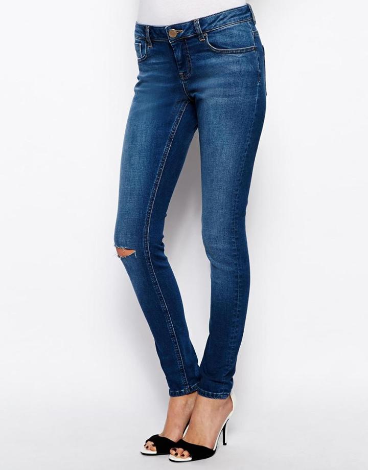 Asos Whitby Low Rise Skinny Jeans In Arizona Blue With Ripped Knee
