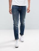 Nudie Jeans Co Grim Tim Jean Slim Fit Revelation Blue Mid Wash - Blue