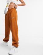 Nike Mini Swoosh Oversized Sweatpants In Tawny Brown