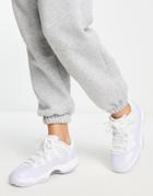 Nike Air Jordan 11 Retro Low Sneakers In White/pure Violet