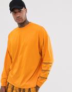 Asos Design Oversized Long Sleeve T-shirt With Authentique Back Print - Orange