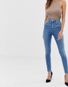 Asos Design Ridley High Waisted Skinny Jeans In Pretty Mid Stonewash Blue - Blue