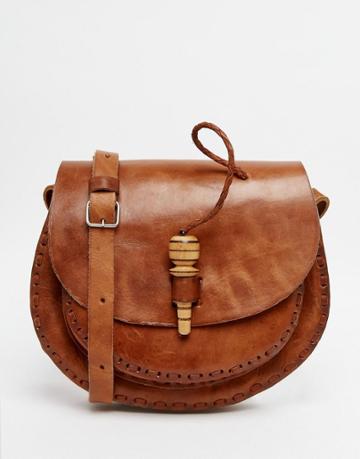 Hiptipico Leather Saddle Bag With Peg Fastening - Tan