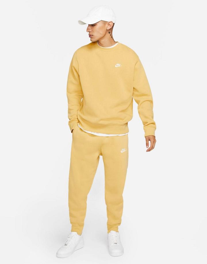 Nike Club Fleece Cuffed Sweatpants In Dusty Yellow