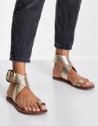 Asos Design Flyer Leather Toe Loop Flat Sandals In Gold