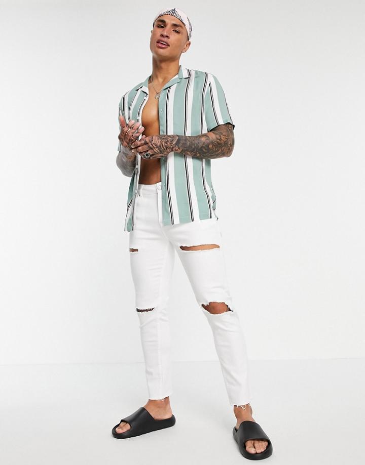 Asos Design Skinny Jeans In White With Rips And Raw Hem