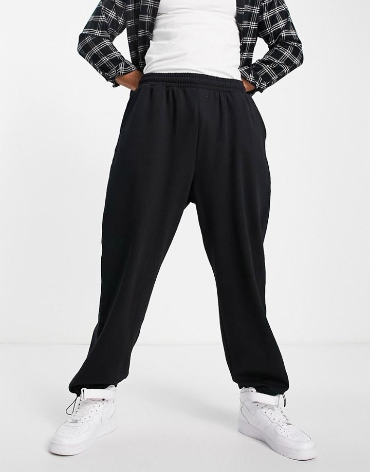 Asos Design Oversized Joggers In Black With Toggle Hem - Black