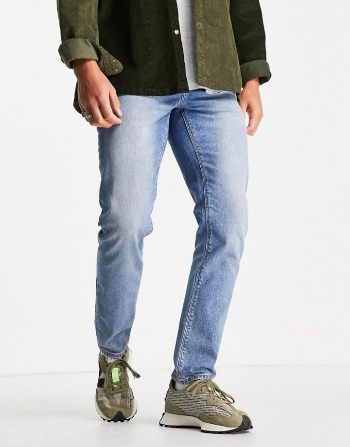 Asos Design Stretch Slim Jeans In Tinted Vintage Light Wash Blue-blues