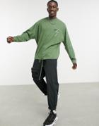 Asos Dark Future Oversized Long Sleeve T-shirt With Back Print And Drawstring In Green