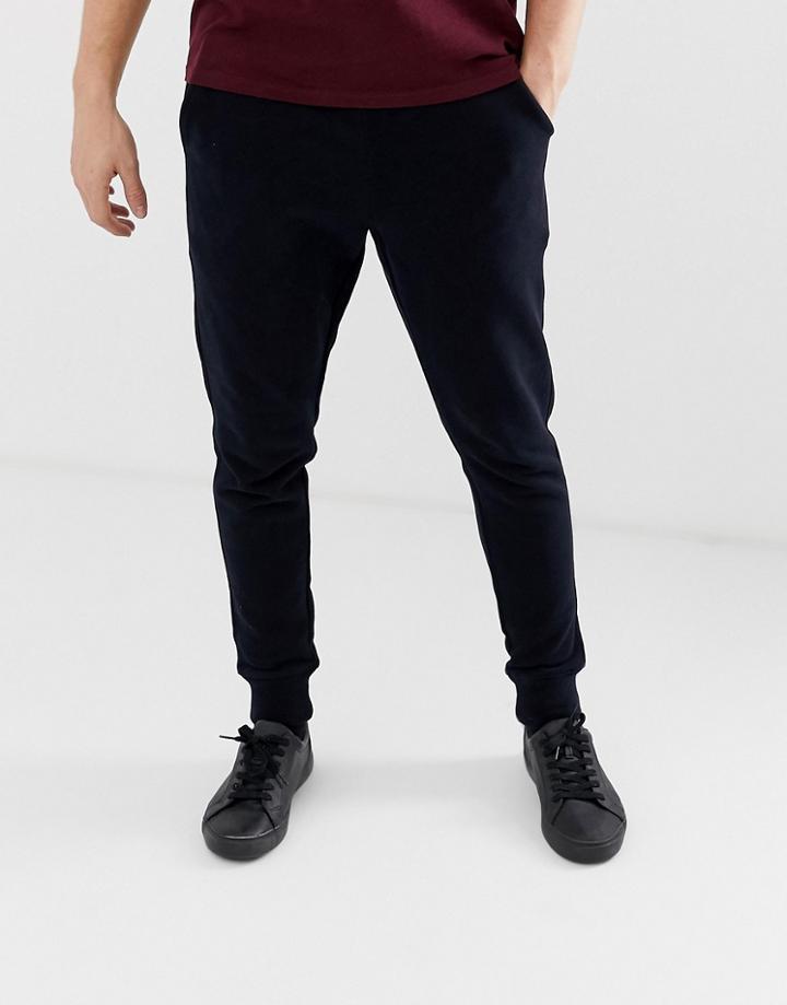 Allsaints Cuffed Jogger In Navy With Ramskull Logo - Gray