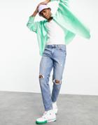 Asos Design Stretch Tapered Jeans In Tinted Mid Wash With Knee Rips-blues