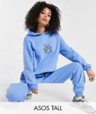 Asos Design Tall Tracksuit Oversized Hoodie / Oversized Sweatpants With Ski Motif In Blue-neutral