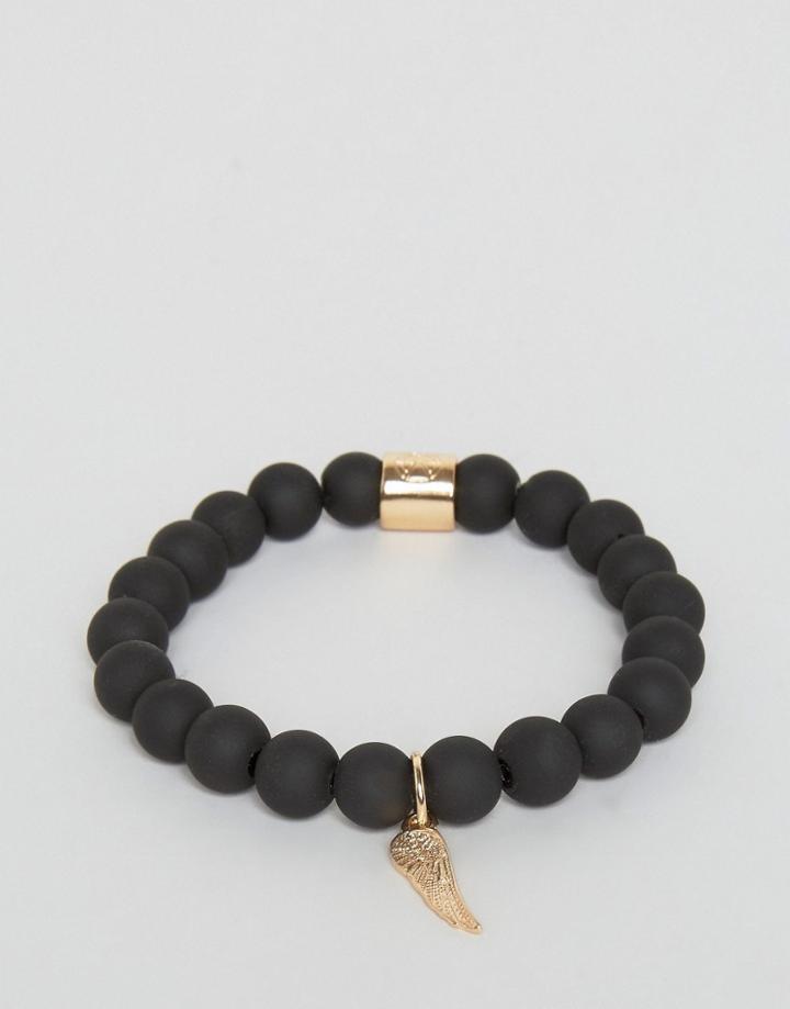Chained & Able Gold Hanging Wing Beaded Bracelet In Matte Black - Black