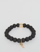 Chained & Able Gold Hanging Wing Beaded Bracelet In Matte Black - Black