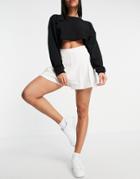 Lacoste Pleated Tennis Skort In Cream-white