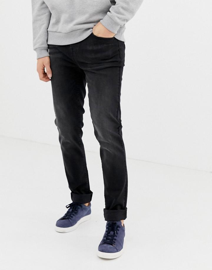Ldn Dnm Skinny Jeans In Washed Black