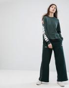 Ellesse Wide Leg Tracksuit Bottoms With Sports Stripe - Green