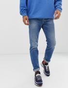 Diesel Larkee-beex Regular Tapered Fit Jeans In 089aw Mid Wash - Blue