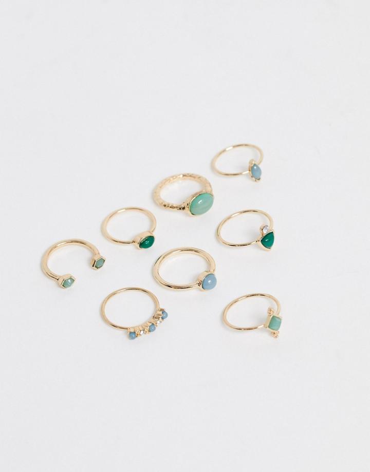 Asos Design Pack Of 8 Rings With Green Shade Stones In Gold Tone