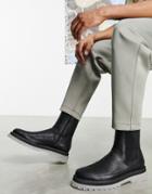 Asos Design Chelsea Calf Boots In Black Faux Leather With Clear Chunky Sole