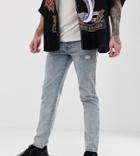 Heart & Dagger Distressed Jeans In Mid-wash-blue