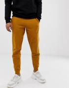 Asos Design Tapered Sweatpants In Mustard - Yellow