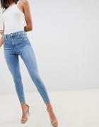Asos Design Ridley High Waisted Skinny Jeans In Pretty Mid Stonewash Blue