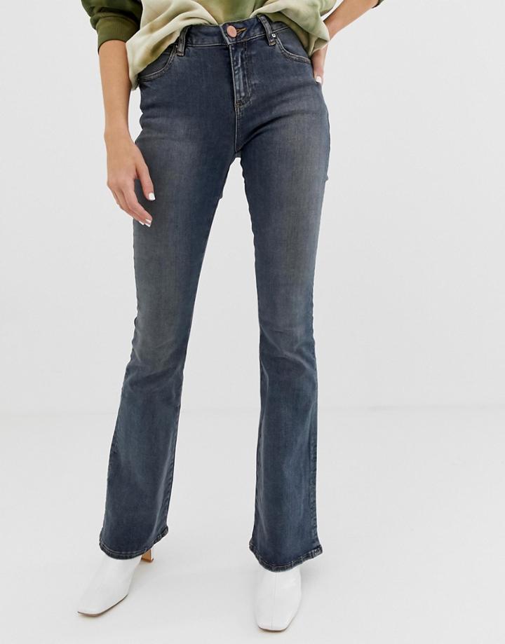 Asos Design Mid Rise Flare Jeans In Dark Stone Wash Blue - Blue