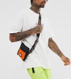 Reclaimed Vintage Unisex Cross Over Pouch In Black And Orange