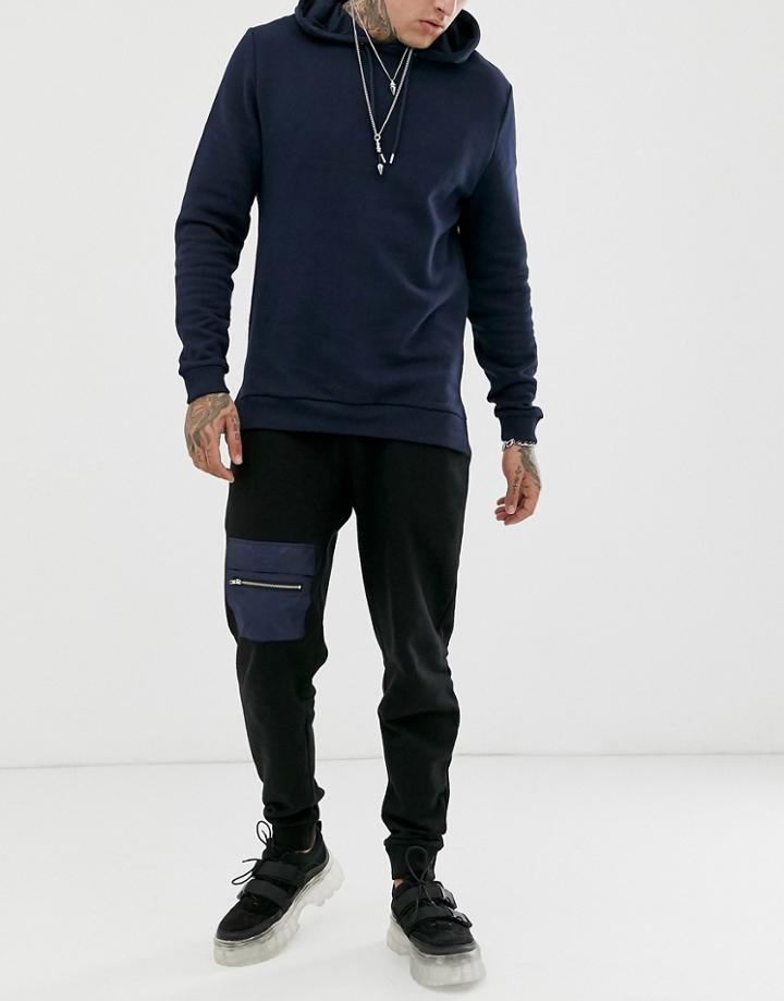Asos Design Jersey Tapered Sweatpants With Thigh Pocket In Black