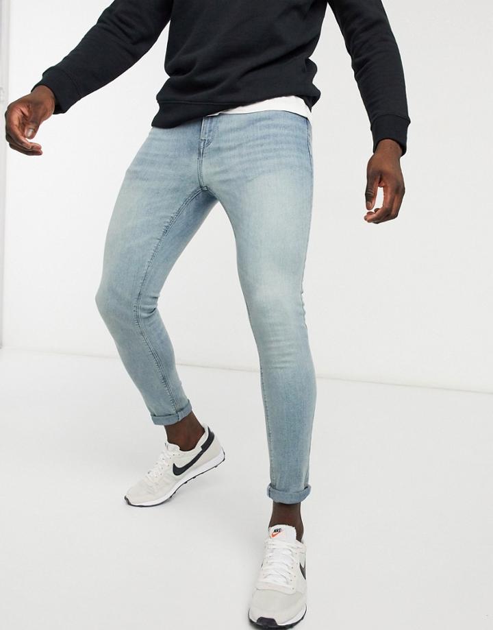 Asos Design Super Skinny Ankle Grazer Jeans In Light Blue Vintage Tint