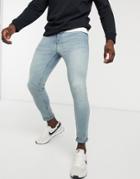 Asos Design Super Skinny Ankle Grazer Jeans In Light Blue Vintage Tint