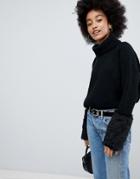 Lasula Roll Neck Sweater With Faux Fur Cuffs - Black