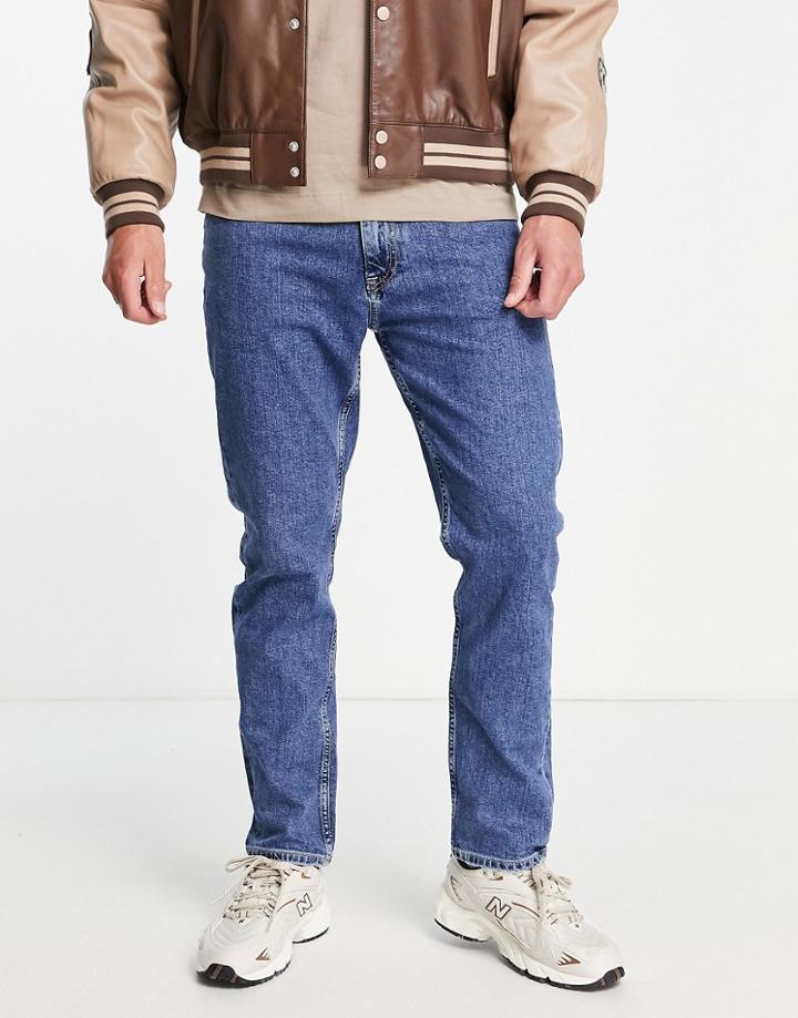 Tommy Jeans Dad Regular Tapered Fit Jeans In Dark Wash-navy
