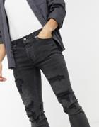 Topman Skinny Jeans With Rip And Repair In Washed Black