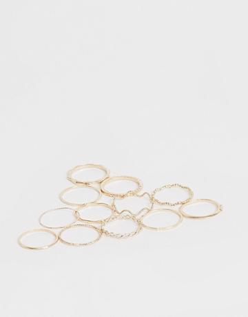 Asos Design Pack Of 12 Rings With Twist Details And Engraved Designs In Gold Tone