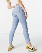 River Island Amelie Ripped Knee Raw Hem Skinny Jeans In Light Auth Blue-blues