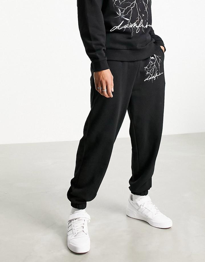 Asos Dark Future Oversized Sweatpants With Graphic Print In Black - Part Of A Set