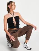 Asos Design Knitted Halter Neck Top With Lace Up Front In Black