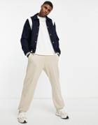 Asos Design Varsity Bomber Jacket In Navy With Contrast White Inserts