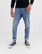 Asos Design Tapered Jeans In Mid Wash Blue