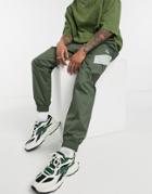 Puma Tfs Track Pants In Green Color Block