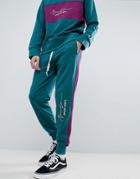 Mennace Retro Joggers In Teal With Logo - Green